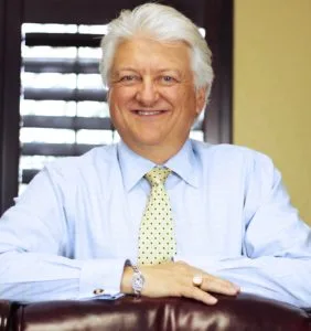 Portrait of Greg Winteregg, a dental consultant in casual attire.