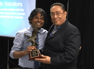 MGE Management Experts CEO Luis Colon presenting award to Arvind Philomin DDS