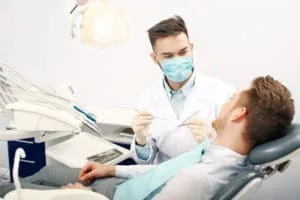 dentist preparing treatment room