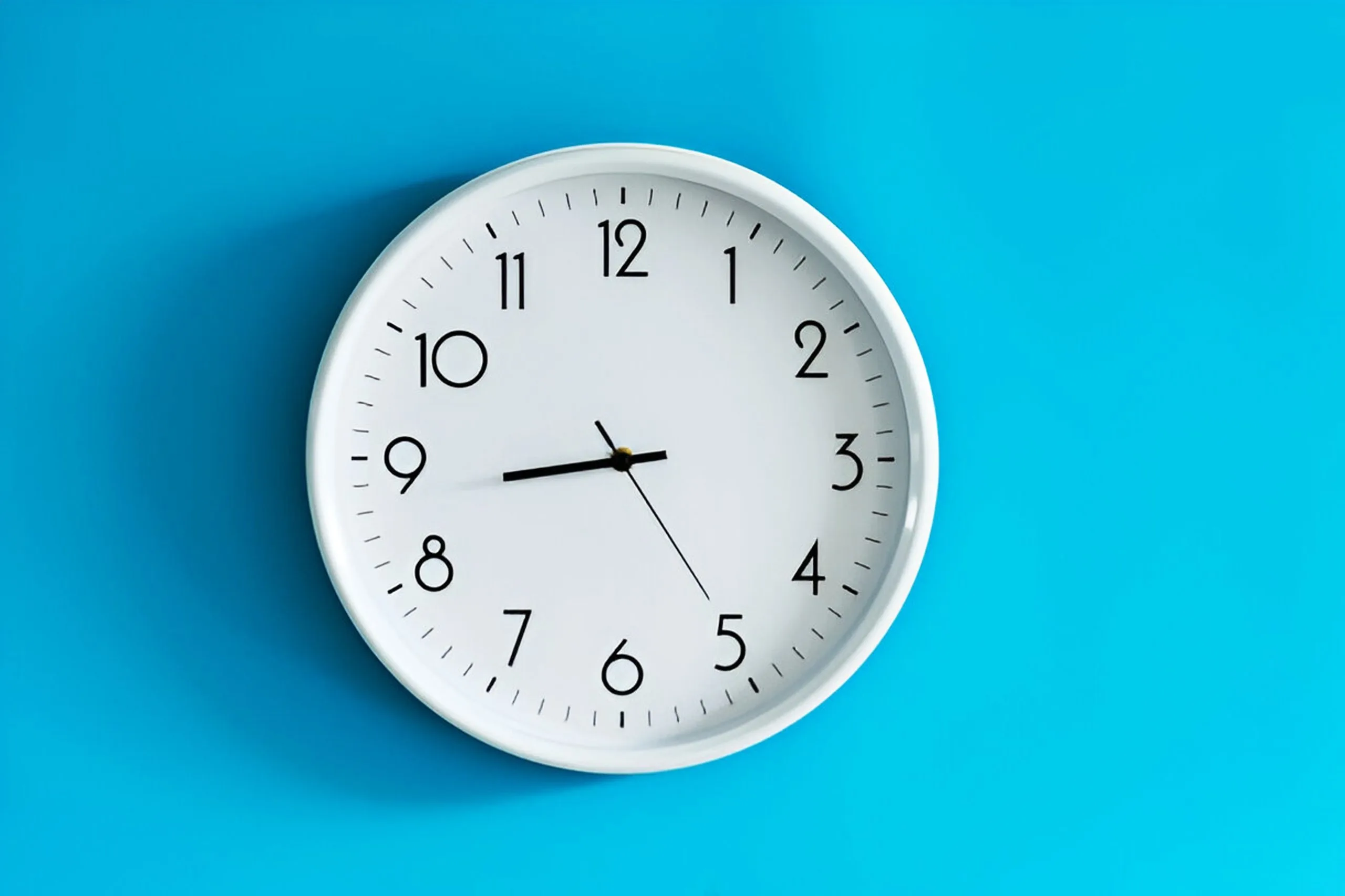 A wall-mounted analog clock.