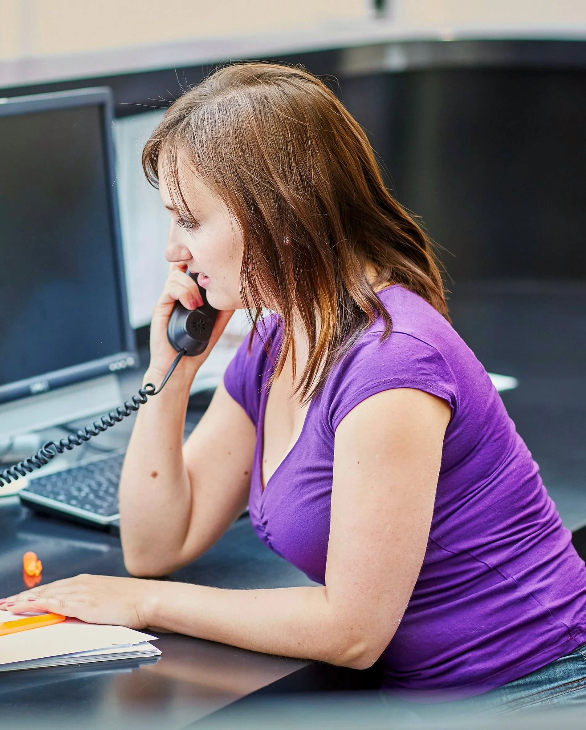 A woman talking on the phone.